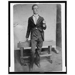   of a man in front of a wooden bench,1890 1910,Tintype: Home & Kitchen