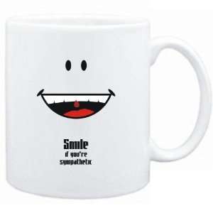   Mug White  Smile if youre sympathetic  Adjetives