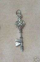 Sterling Silver Fancy Skeleton Key with Hearts Charm!  
