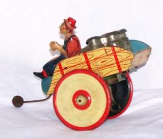 Antique Tin Windup Working Milk Cart Hee Haw Toy  