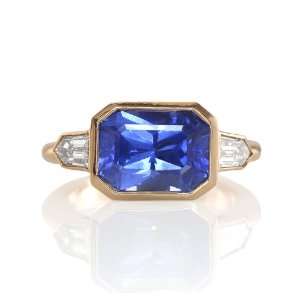 01ct Natural Untreated Blue sapphireRing 18kR Gold with 2 Diamonds0 