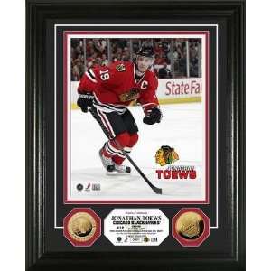  Jonathan Toews Framed 8 x 10 Photograph (Red Jersey) and 