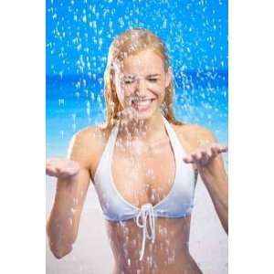 Young Happy Woman Taking Shower or under Rain on Beach   Peel and 