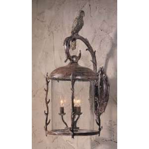 Aviary outdoor   wall mounted light in rust patina with hand painted g
