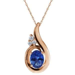 66 Ct Oval Sapphire Blue Mystic Topaz and Diamond Gold Plated Silver 