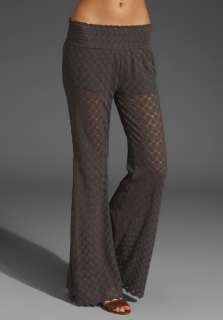 FREE PEOPLE Scalloped Lace Flare Pant in Charcoal at Revolve Clothing 