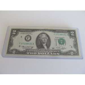 1976 Two Dollar Bill Uncirculated with Stain and/or Bend. Bicentennial 