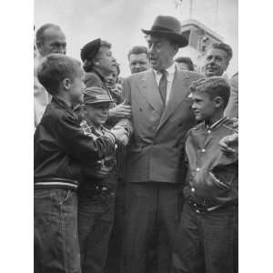 Adlai E. Stevenson Shaking Hands with a Young Kid During His Campaign 