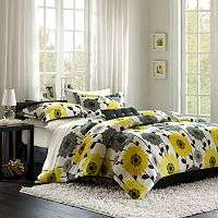   bedding collection with this classic comforter set. In black/tan