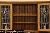   glass doors and is authentic arts and crafts period furniture from